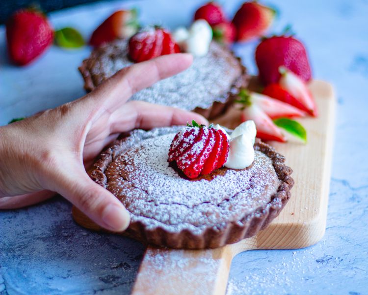 Nutella Dessert Pizza with strawberries and powdered sugar